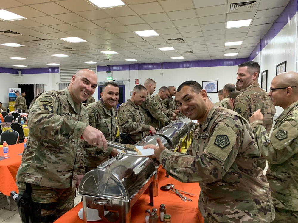 Deployed Illinois Army National Guard Soldiers celebrate Thanksgiving at Camp Taji, Iraq