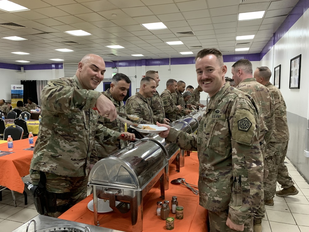 Deployed Illinois Army National Guard Soldiers celebrate Thanksgiving at Camp Taji, Iraq