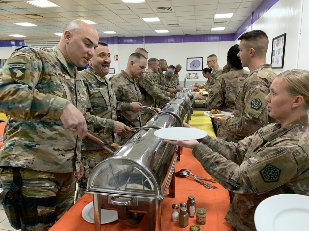 Deployed Illinois Army National Guard Soldiers celebrate Thanksgiving at Camp Taji, Iraq