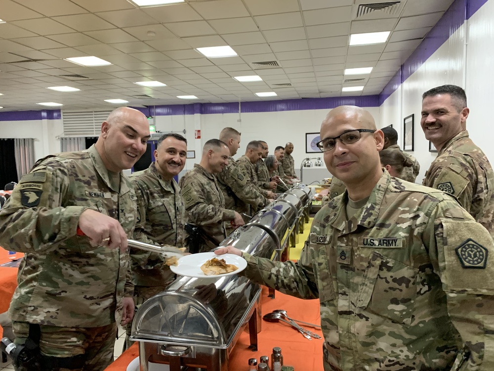 Deployed Illinois Army National Guard Soldiers celebrate Thanksgiving at Camp Taji, Iraq