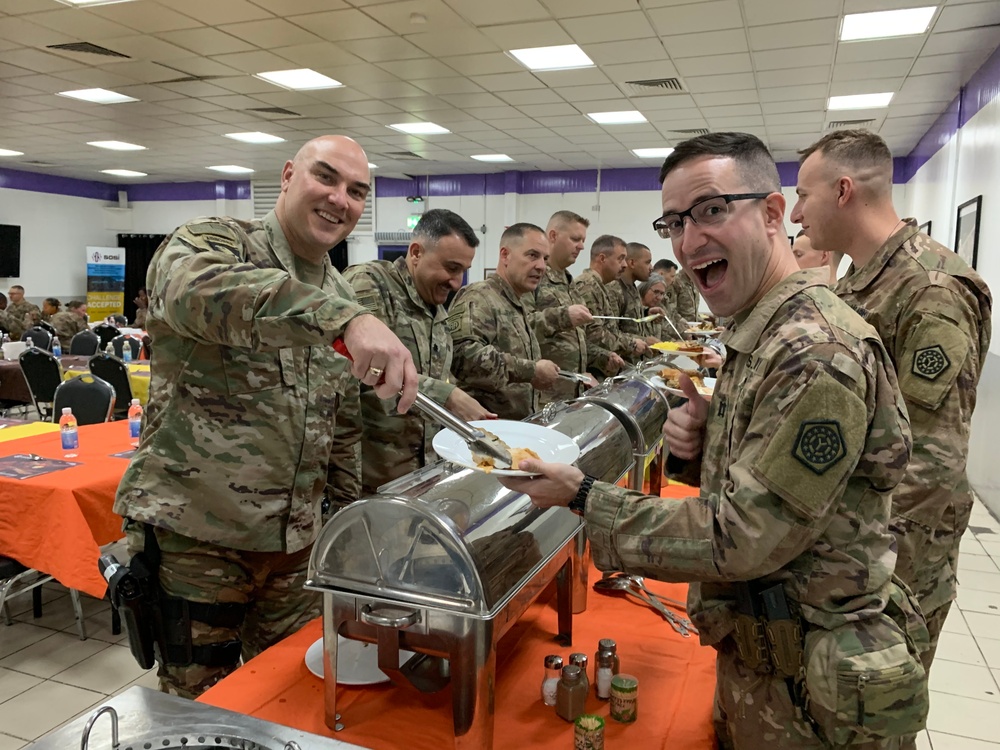 Deployed Illinois Army National Guard Soldiers celebrate Thanksgiving at Camp Taji, Iraq