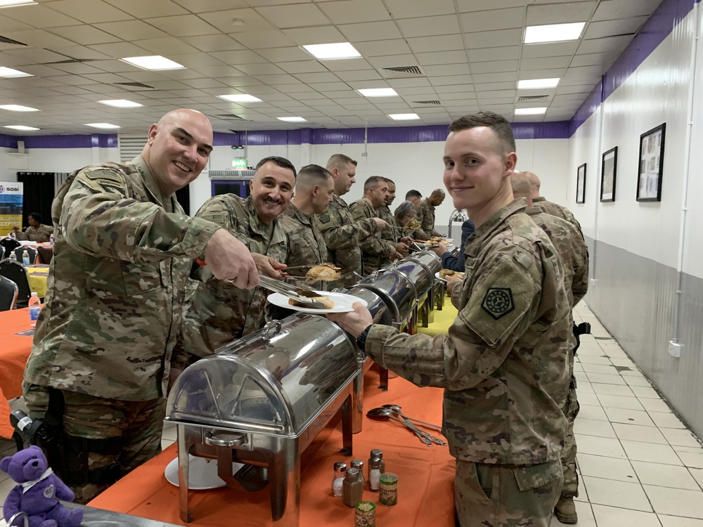 Deployed Illinois Army National Guard Soldiers celebrate Thanksgiving at Camp Taji, Iraq