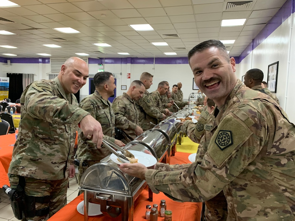 Deployed Illinois Army National Guard Soldiers celebrate Thanksgiving at Camp Taji, Iraq