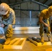 U.S. Navy Seabees deployed with NMCB-5's Detail Atsugi construct a loading dock at the Navy Exchange, Naval Air Facility Atsugi