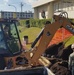 U.S. Navy Seabees deployed with NMCB-5's Detail Atsugi construct a loading dock at the Navy Exchange, Naval Air Facility Atsugi