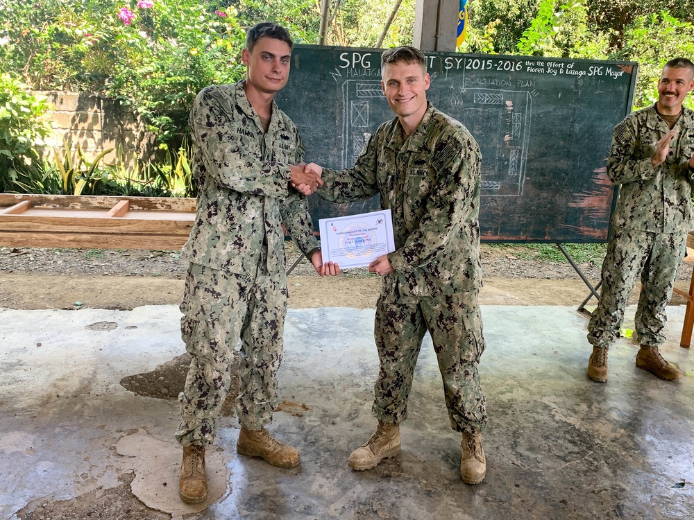 U.S. Navy Seabees deployed with NMCB-5’s Detail Palawan continue construction on Malatgao Elementary School