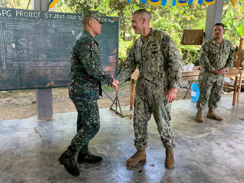 U.S. Navy Seabees deployed with NMCB-5’s Detail Palawan continue construction on Malatgao Elementary School