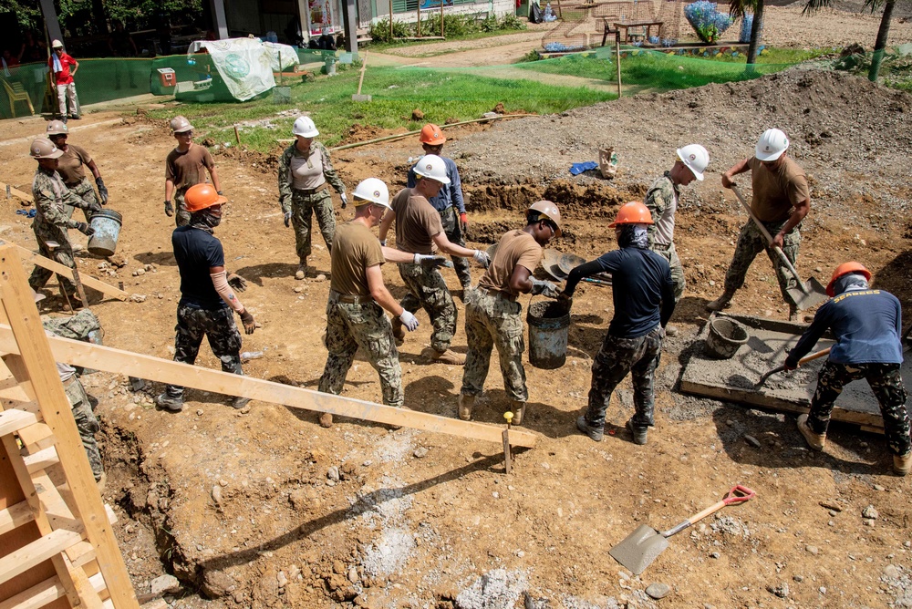 U.S. Navy Seabees deployed with NMCB-5’s Detail Palawan continue construction on Malatgao Elementary School