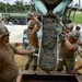U.S. Navy Seabees with NMCB-5 place concrete at Camp Shields