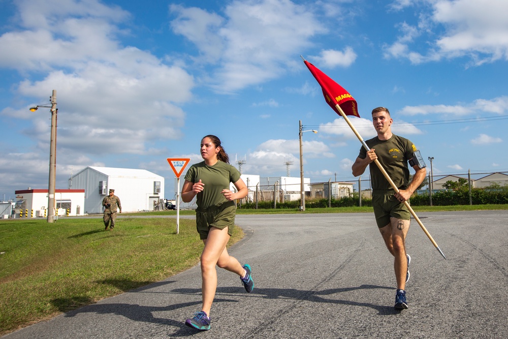 MTACS-18 Marines run to celebrate the 244th Marine Corps birthday