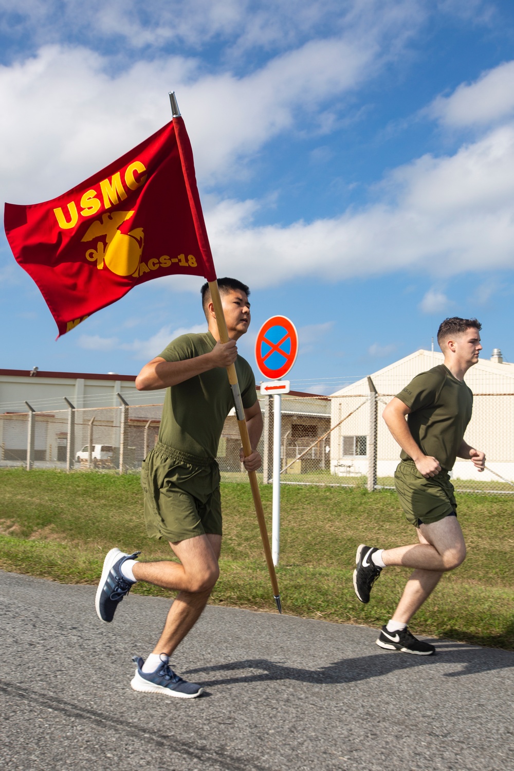 MTACS-18 Marines run to celebrate the 244th Marine Corps birthday