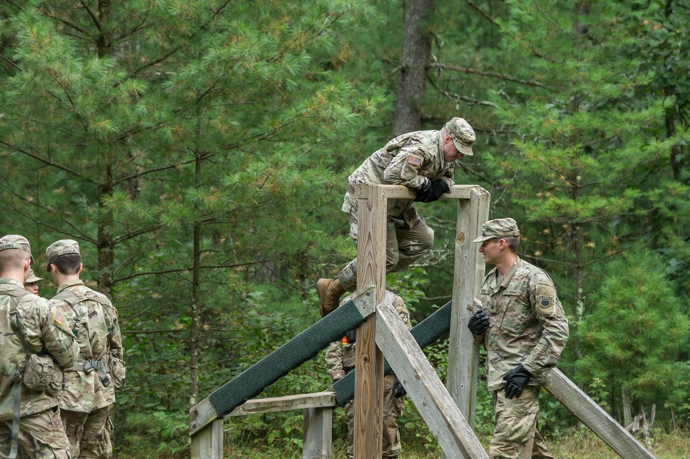 ROTC Madison Wisconsin Area students rappel and build teamwork on the confidence course at Total Force Training Center Ft. McCoy