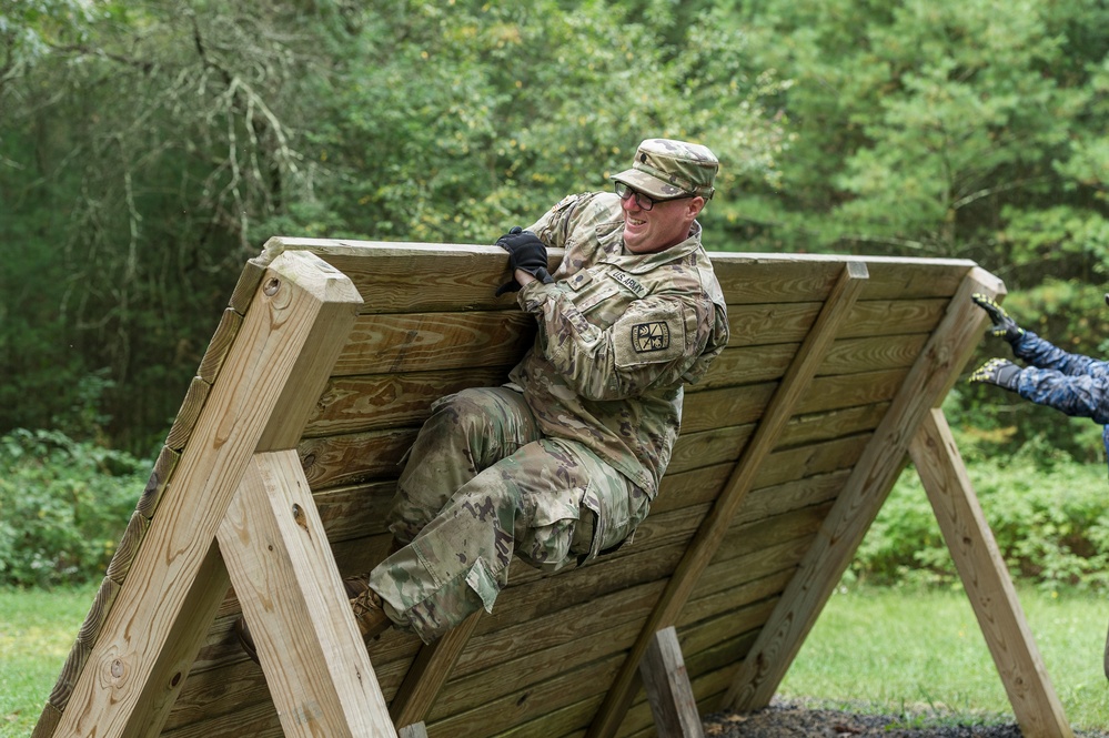 ROTC Madison Wisconsin Area students rappel and build teamwork on the confidence course at Total Force Training Center Ft. McCoy