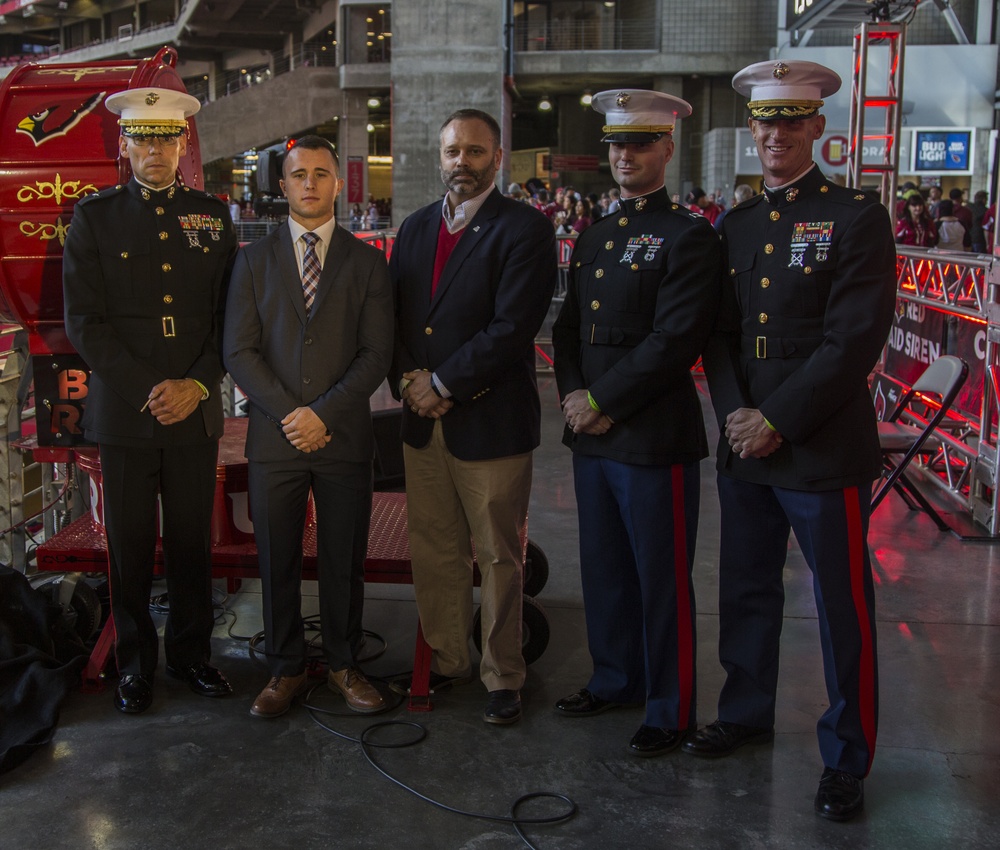 Marine Officer Candidate receives Commandants Trophy at Ariz Cardinals Game