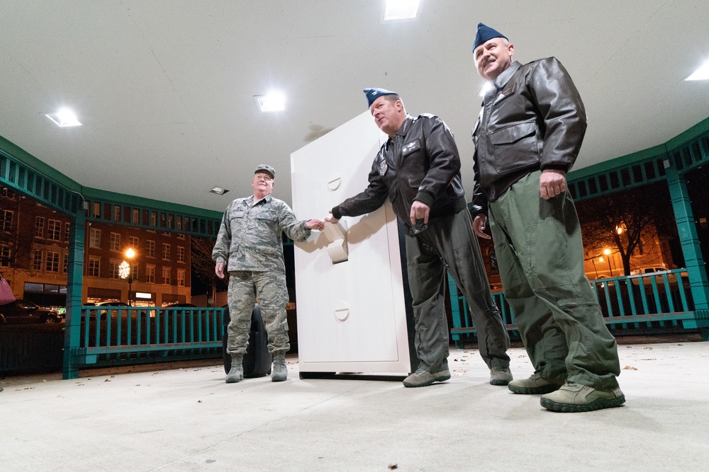 Members of the 139th Airlift Wing flip the switch to the Holiday Season