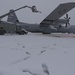 Hercules Airmen de-ice aircraft, re-ice each other