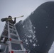 Hercules Airmen de-ice aircraft, re-ice each other