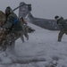 Hercules Airmen de-ice aircraft, re-ice each other