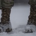 Hercules Airmen de-ice aircraft, re-ice each other