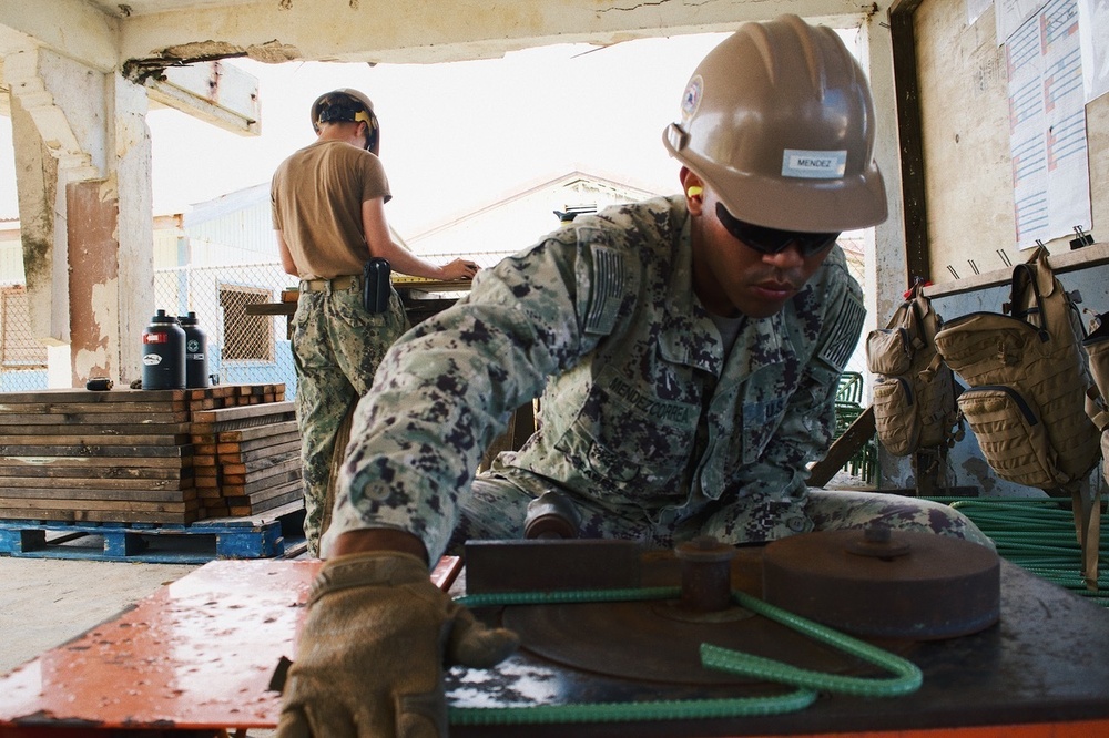 Seabees deployed with Naval Mobile Construction Battalion 5's Detail Marshall Islands continue work on the Ennibur Evacuation Center project