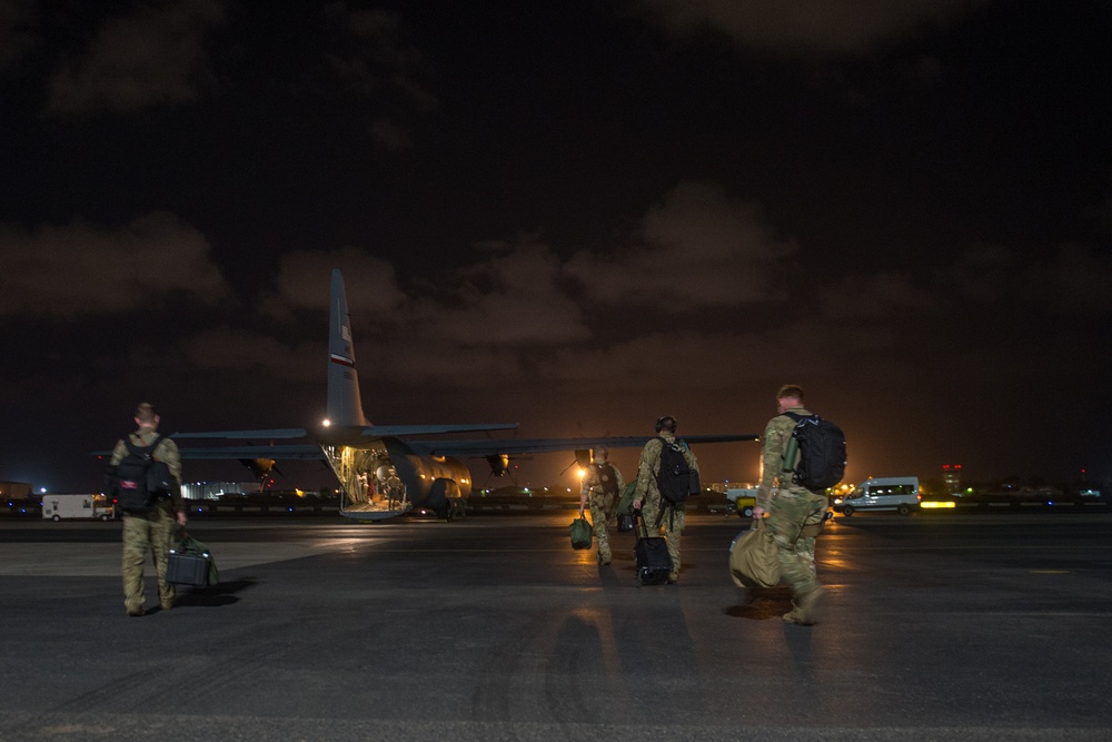 75th Expeditionary Airlift Squadron resupplies units at night