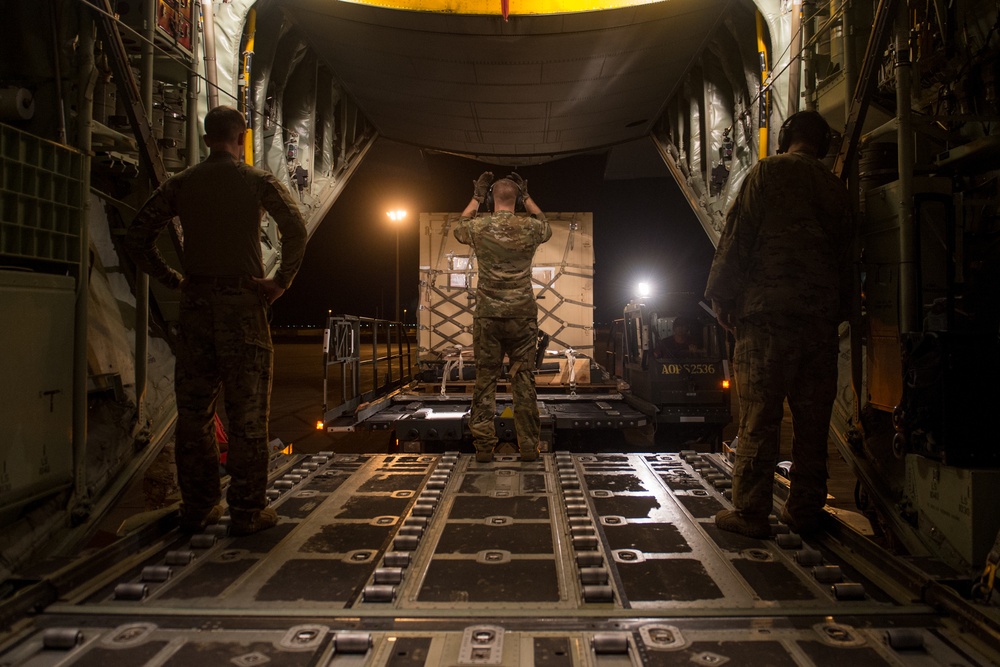 75th Expeditionary Airlift Squadron resupplies units at night