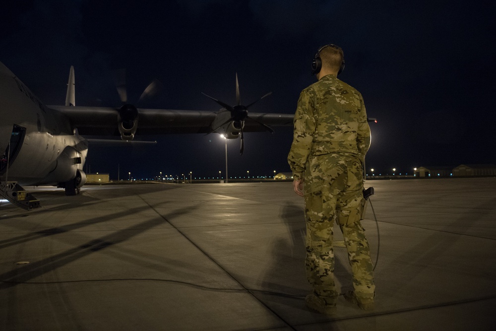 75th Expeditionary Airlift Squadron resupplies units at night