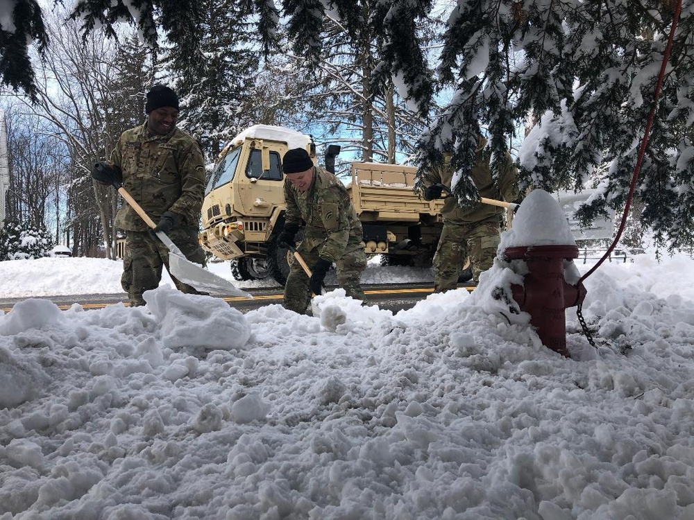 NY Army National Guard troops assist in snow storm clean up