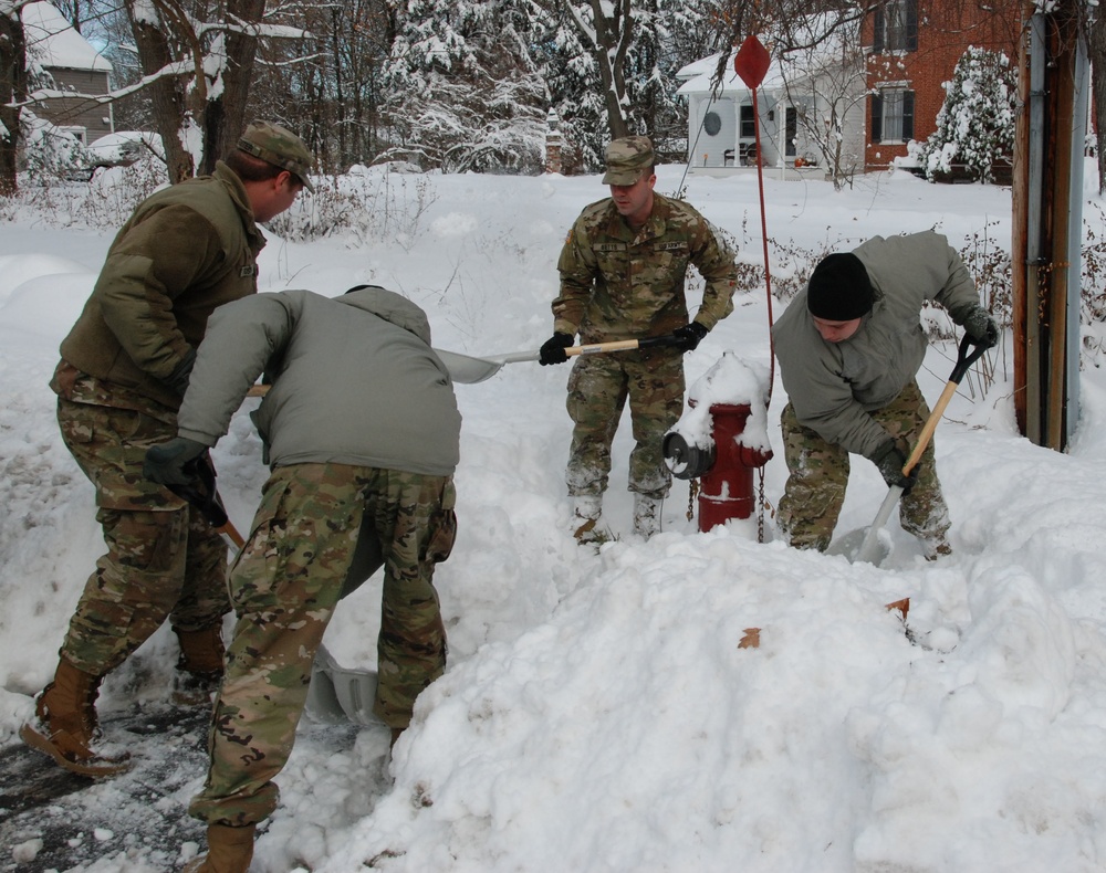 NY Army National Guard troops assist in snow storm clean up