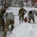 NY Army National Guard troops assist in snow storm clean up