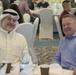 Special Advisor to His Highness the Amir and 386th AEW commander meet at holiday banquet
