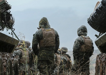Marines with SOI-West engage targets during LAR Marine Course