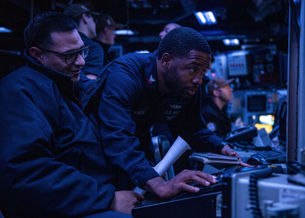 USS Makin Island Sailors monitor radar systems aboard the ship.