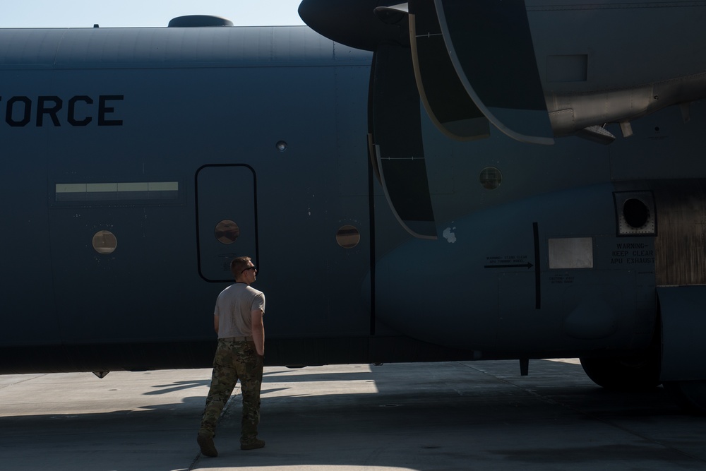 75th Expeditionary Airlift Squadron and 82nd Expeditionary Rescue Squadron train in water jumps