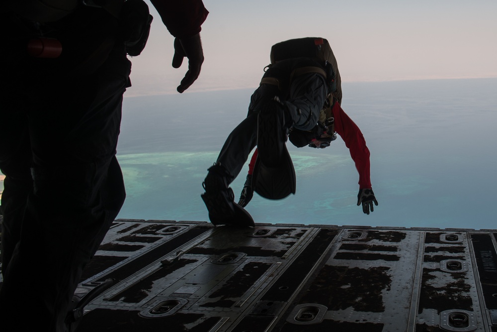 75th Expeditionary Airlift Squadron and 82nd Expeditionary Rescue Squadron train in water jumps