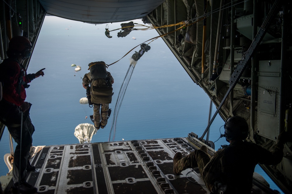 75th Expeditionary Airlift Squadron and 82nd Expeditionary Rescue Squadron train in water jumps