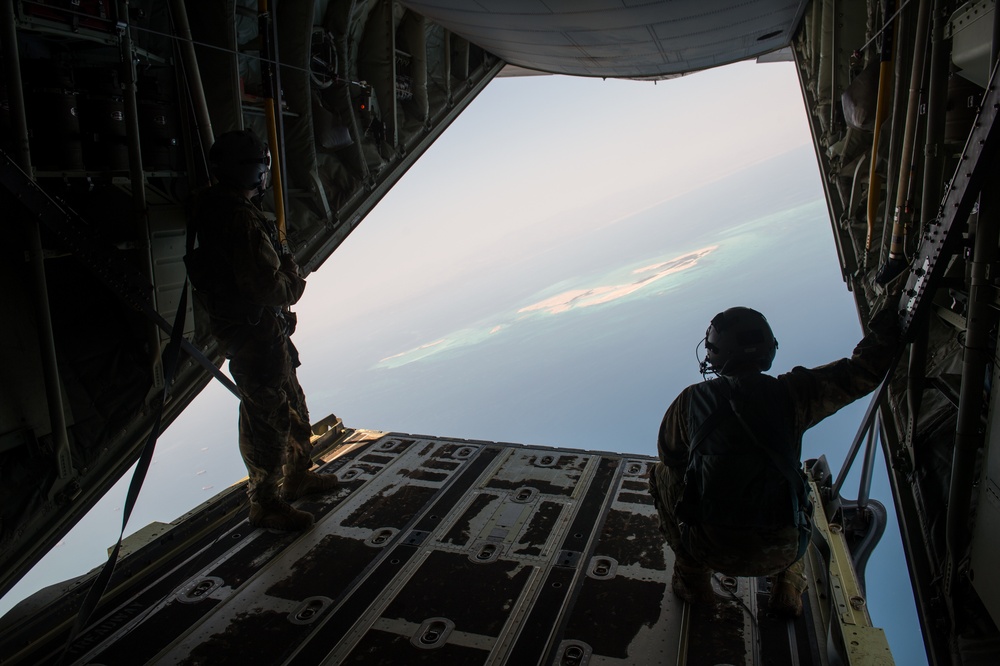 75th Expeditionary Airlift Squadron and 82nd Expeditionary Rescue Squadron train in water jumps