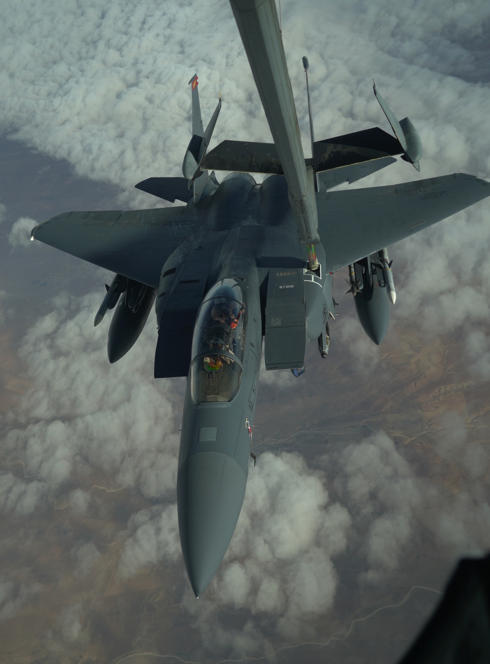 ADAB KC-10 refuels a Strike Eagle over Iraq
