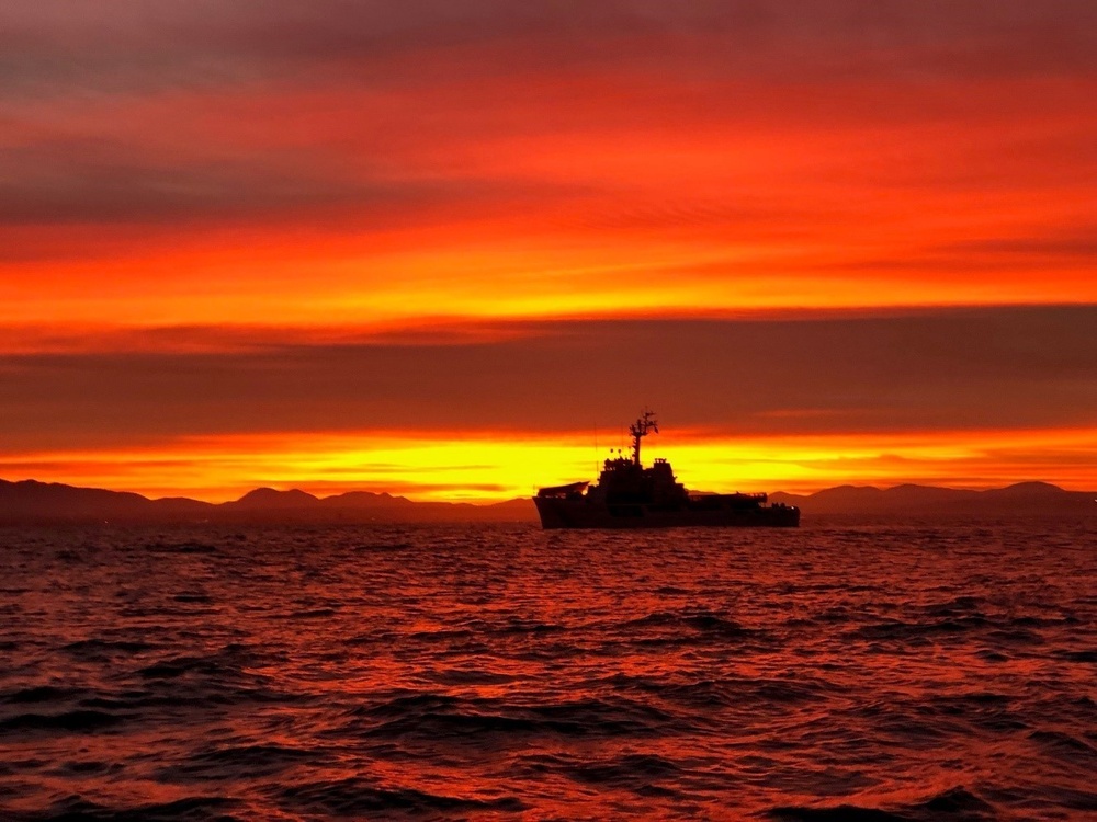 Coast Guard Cutter Steadfast at sunrise