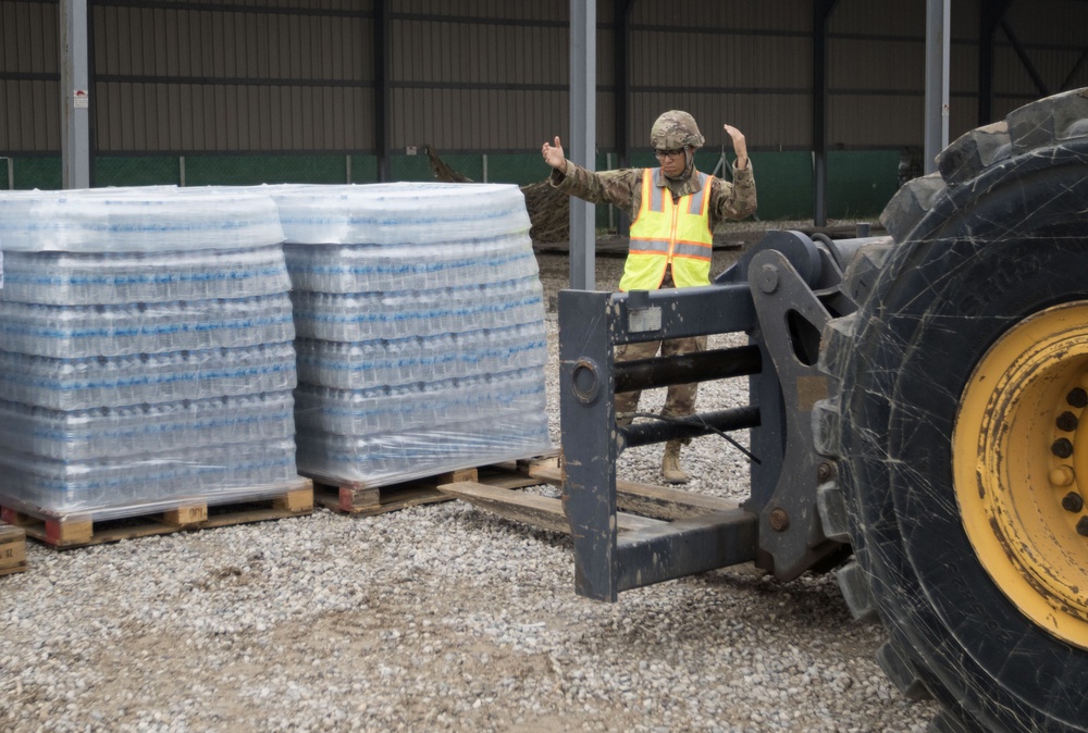 Offloading Pallets of Water in Erbil