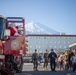 U.S. Marines and the local community come together for a Christmas tree lighting ceremony at CATC Fuji