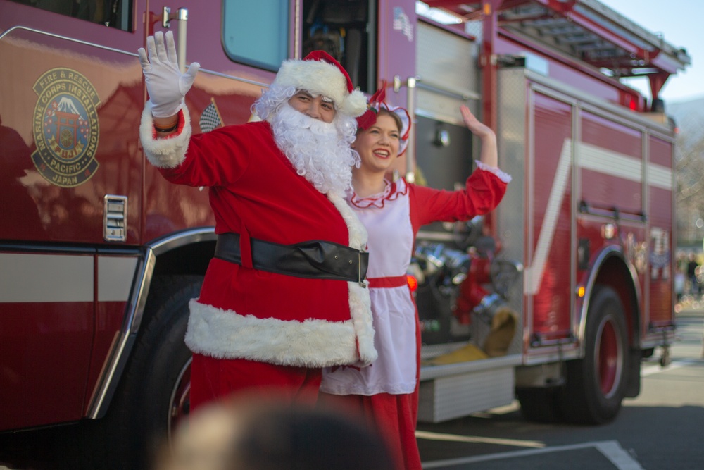 U.S. Marines and the local community come together for a Christmas tree lighting ceremony at CATC Fuji