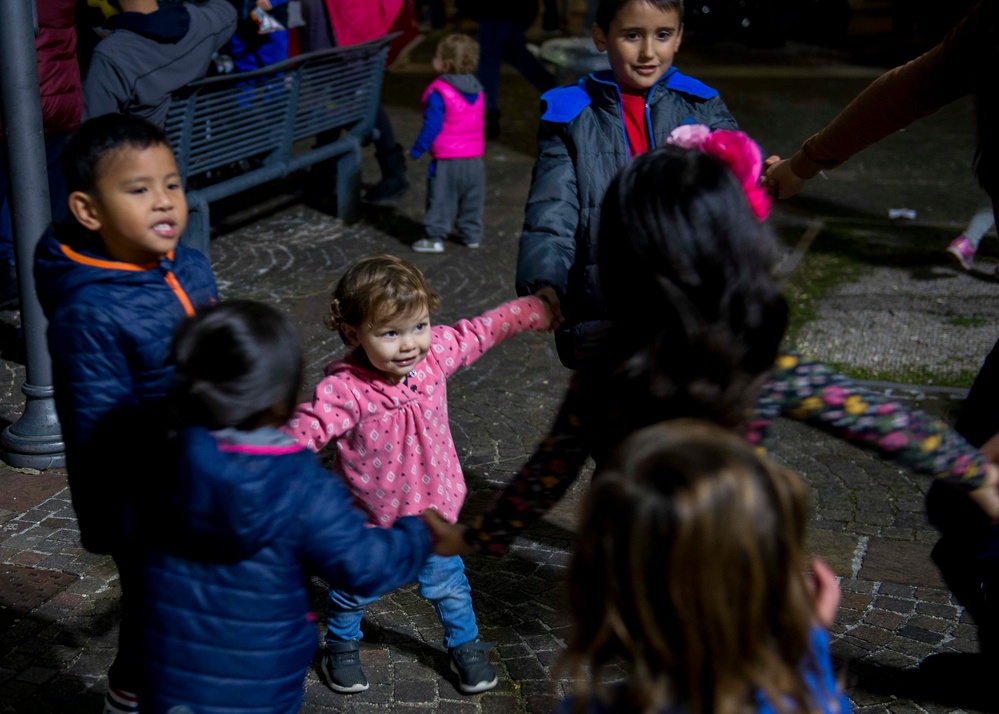 NSA Naples Holds Annual Holiday Village Tree Lighting Event