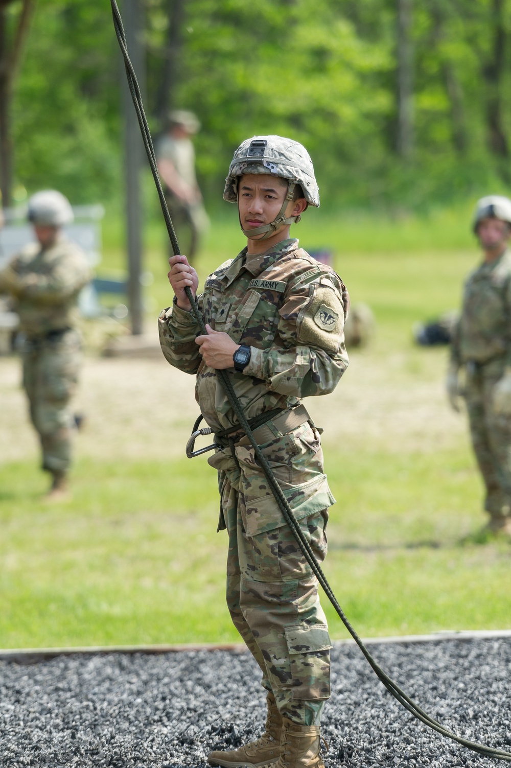 Soldiers from 1157th Transportation Company participate in team building exercises at the Rappel tower, Total Force Training Center Fort McCoy