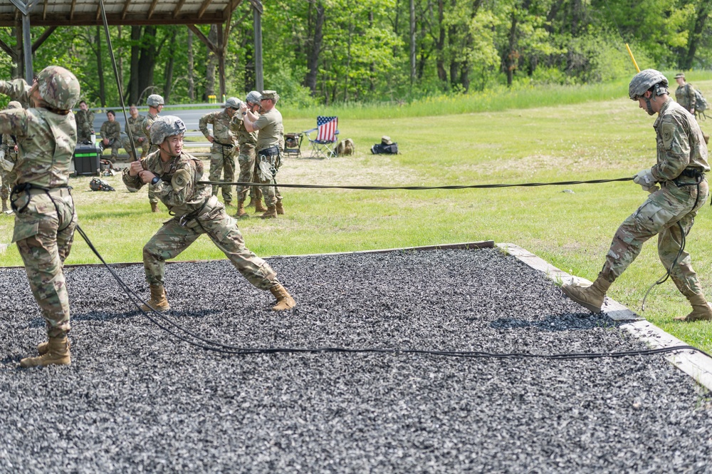 Soldiers from 1157th Transportation Company participate in team building exercises at the Rappel tower, Total Force Training Center Fort McCoy