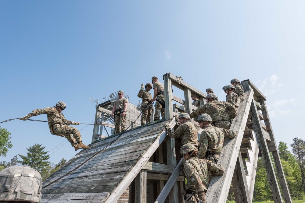 Soldiers from 1157th Transportation Company participate in team building exercises at the Rappel tower, Total Force Training Center Fort McCoy