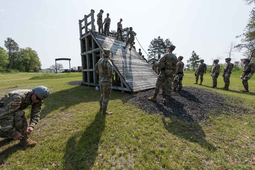 Soldiers from 1157th Transportation Company participate in team building exercises at the Rappel tower, Total Force Training Center Fort McCoy