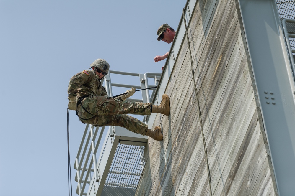 Soldiers from 1157th Transportation Company participate in team building exercises at the Rappel tower, Total Force Training Center Fort McCoy