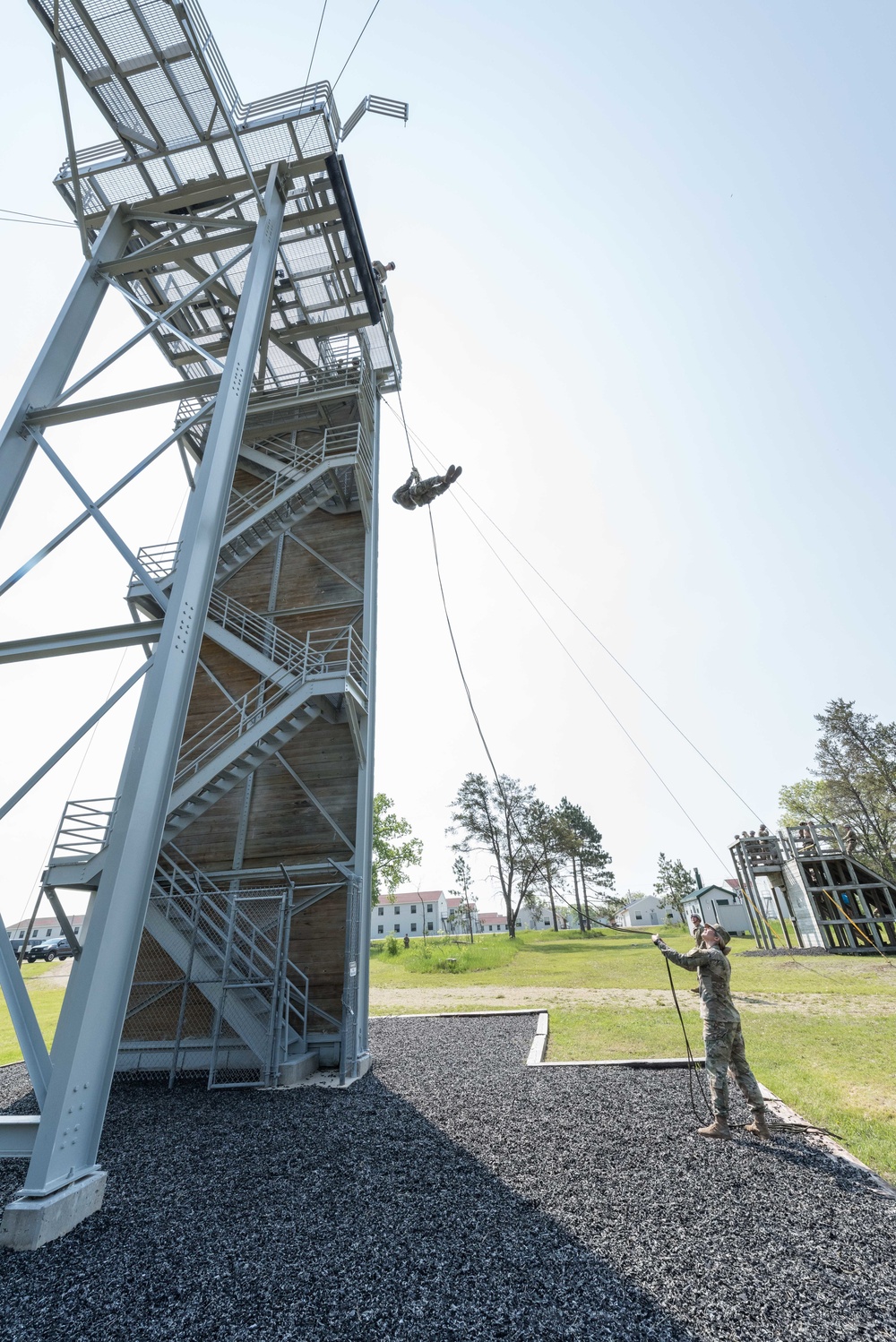 Soldiers from 1157th Transportation Company participate in team building exercises at the Rappel tower, Total Force Training Center Fort McCoy