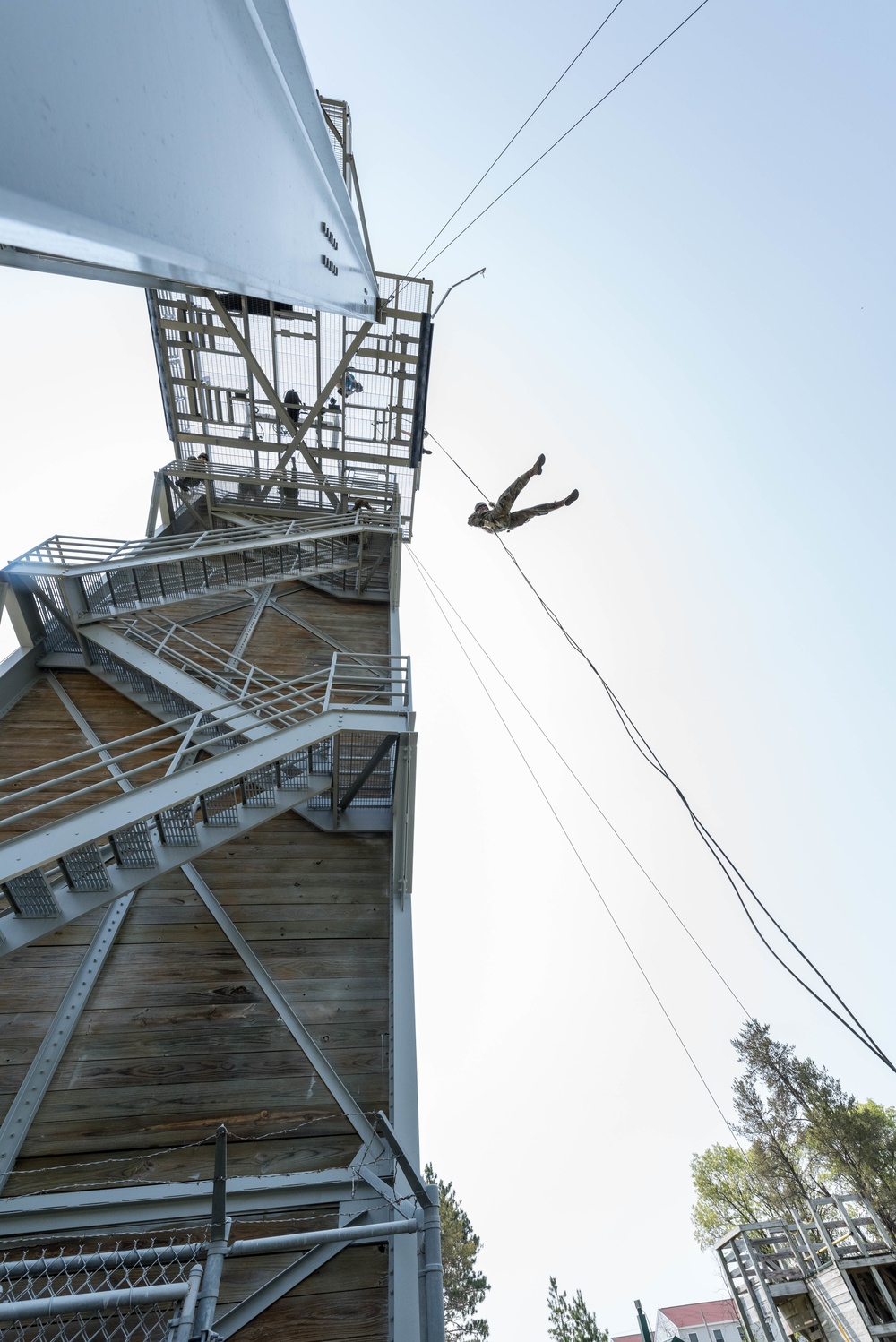 Soldiers from 1157th Transportation Company participate in team building exercises at the Rappel tower, Total Force Training Center Fort McCoy